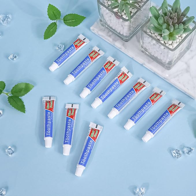 HOIQIRY 0.28 oz Small Travel Size Toothpast Bulk - Pack of 50,Disposable Mint Flavor 0.8x3.14 inches Single Use Mini Toothpaste for Hotel,Camping,Homeless,Charity,Guests,Office,Vacation
