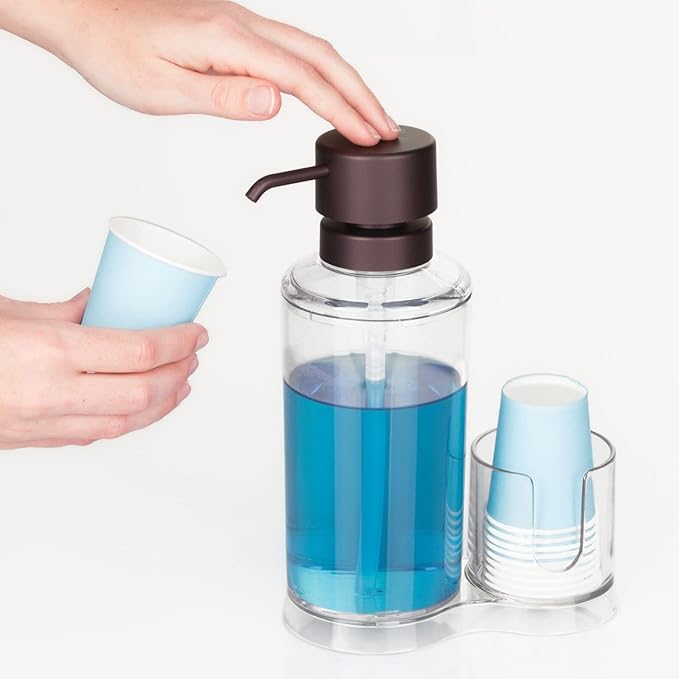 mDesign Plastic Refillable Mouthwash Dispenser and Cup Storage Organizer for Bathroom Vanity, Countertop, Cupboard - Includes 8 Paper Cups - Lumiere Collection - Clear/Bronze