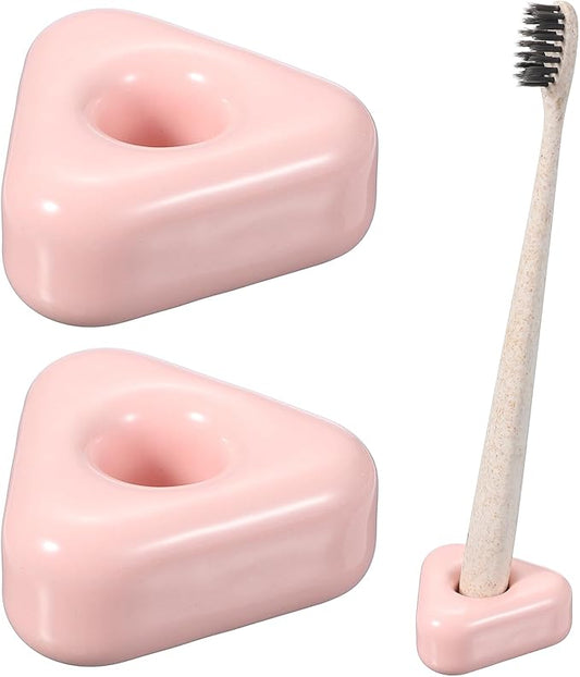 uxcell 2 Pcs Mini Ceramics Toothbrush Holder Stands, Sleek Mini Countertop Toothbrush Triangle Shape Ceramic Holder Stand for Bathroom Vanity Countertops, Pink