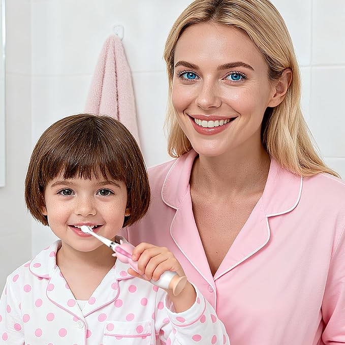 YUNCHI Toddler Electric Toothbrush Kids 0-3-6 Years, Baby Electric Toothbrush with Colorful LED Light, Battery Powered Toddler Toothbrush with 2 Minutes Timer 4 Brush Heads, Infant Toothbrush (Pink)