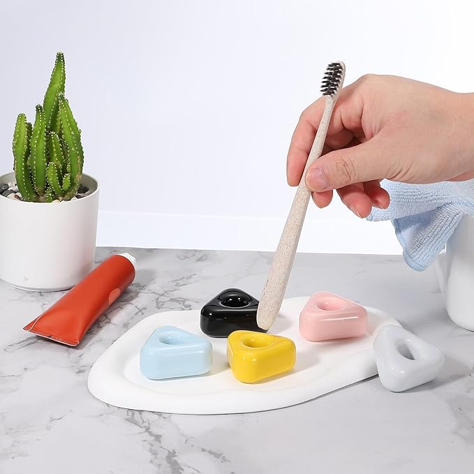 uxcell 2 Pcs Mini Ceramics Toothbrush Holder Stands, Sleek Mini Countertop Toothbrush Triangle Shape Ceramic Holder Stand for Bathroom Vanity Countertops, Yellow
