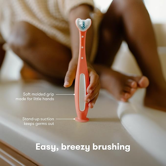 Frida Baby Triple-Angle Toothhugger Training Toddler Toothbrush | Toddler Toothbrush 2 Years and Up, Cleans All Sides at Once | Pink
